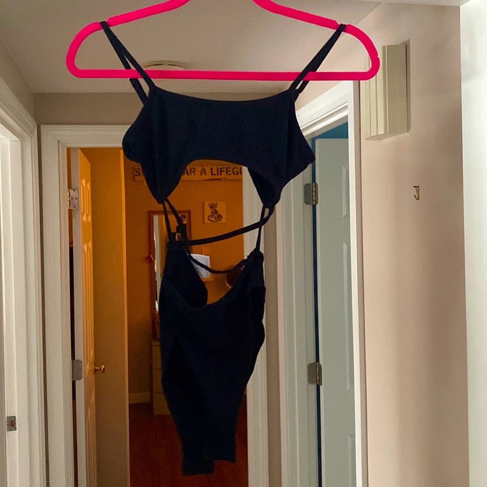 black cutout cross bodysuit